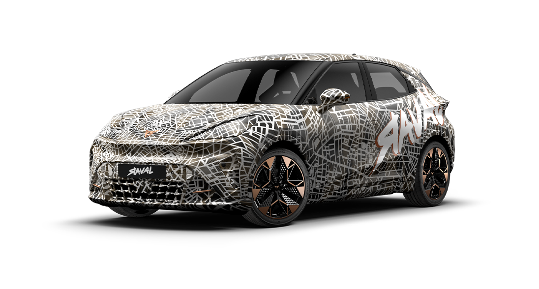 The CUPRA Raval Dynamic Plus is shown from the front three-quarter view, covered in a black and white street map camouflage wrap. The car features black and copper-accented wheels and has the word "RAVAL" on the front grille.