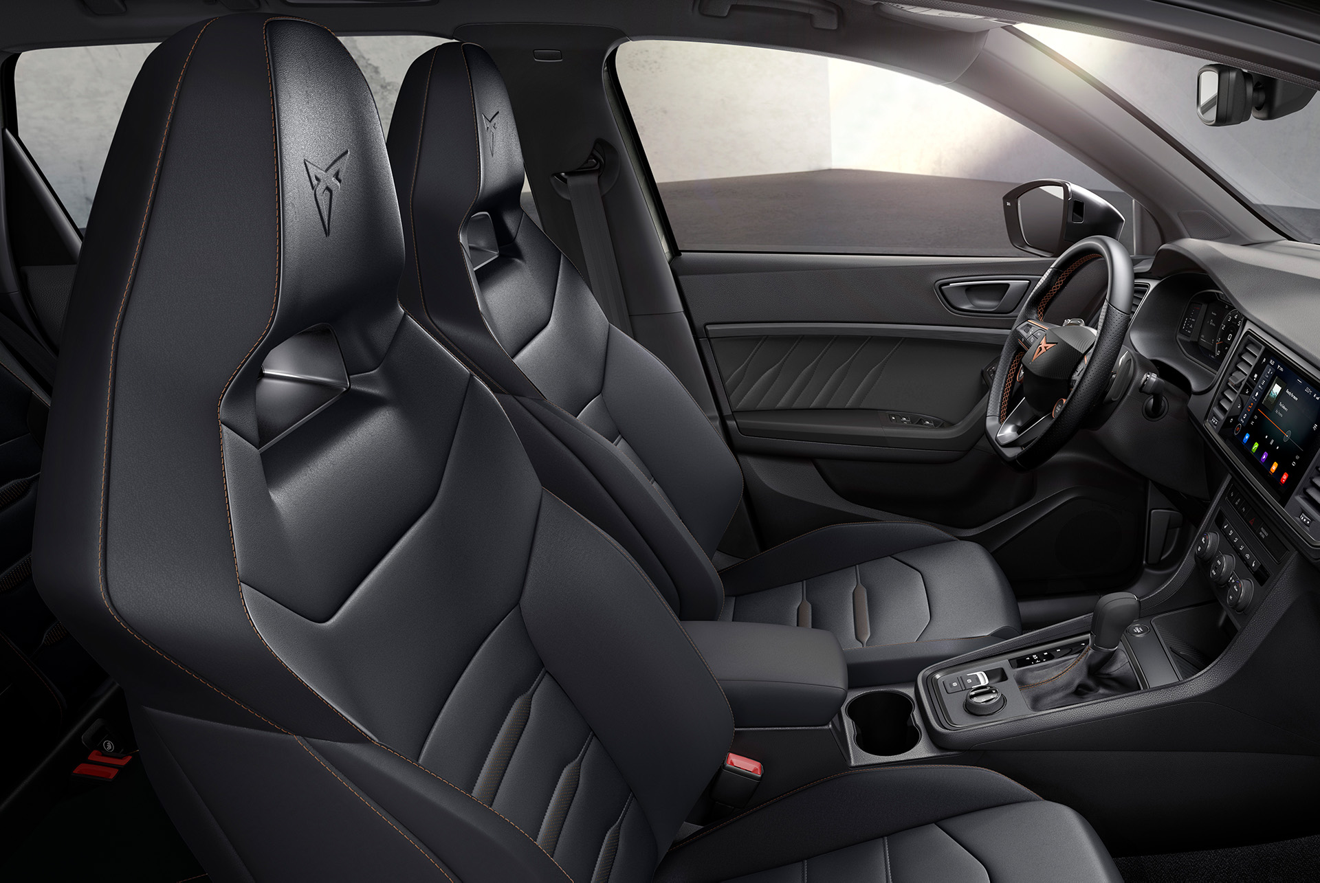 Interior view of the CUPRA Ateca with genuine Black Leather sporty Bucket seats, offering a polished and sophisticated look to enhance your driving experience.