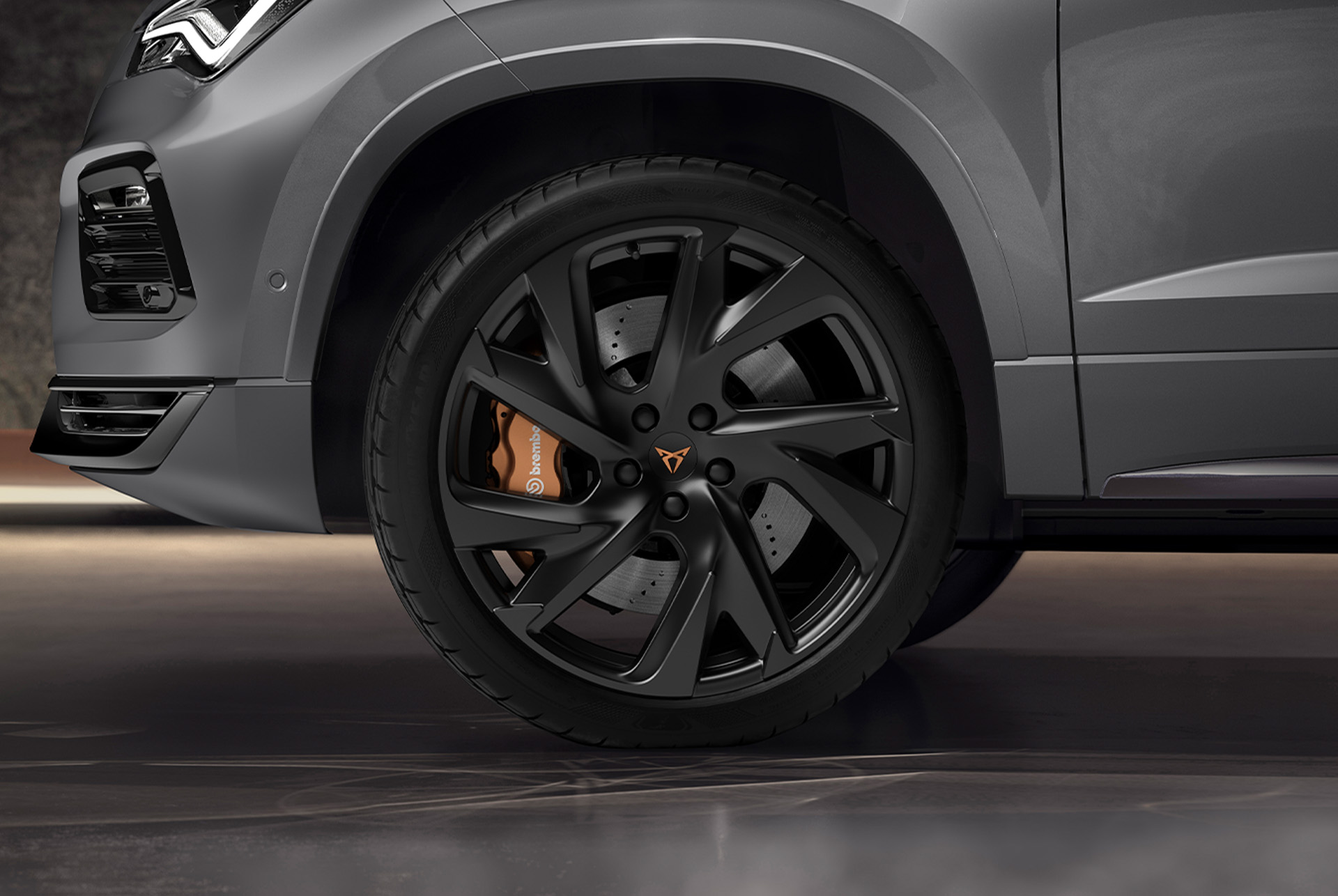 Close-up of the CUPRA Ateca's performance brakes featuring Brembo calipers, providing award-winning stopping power. 