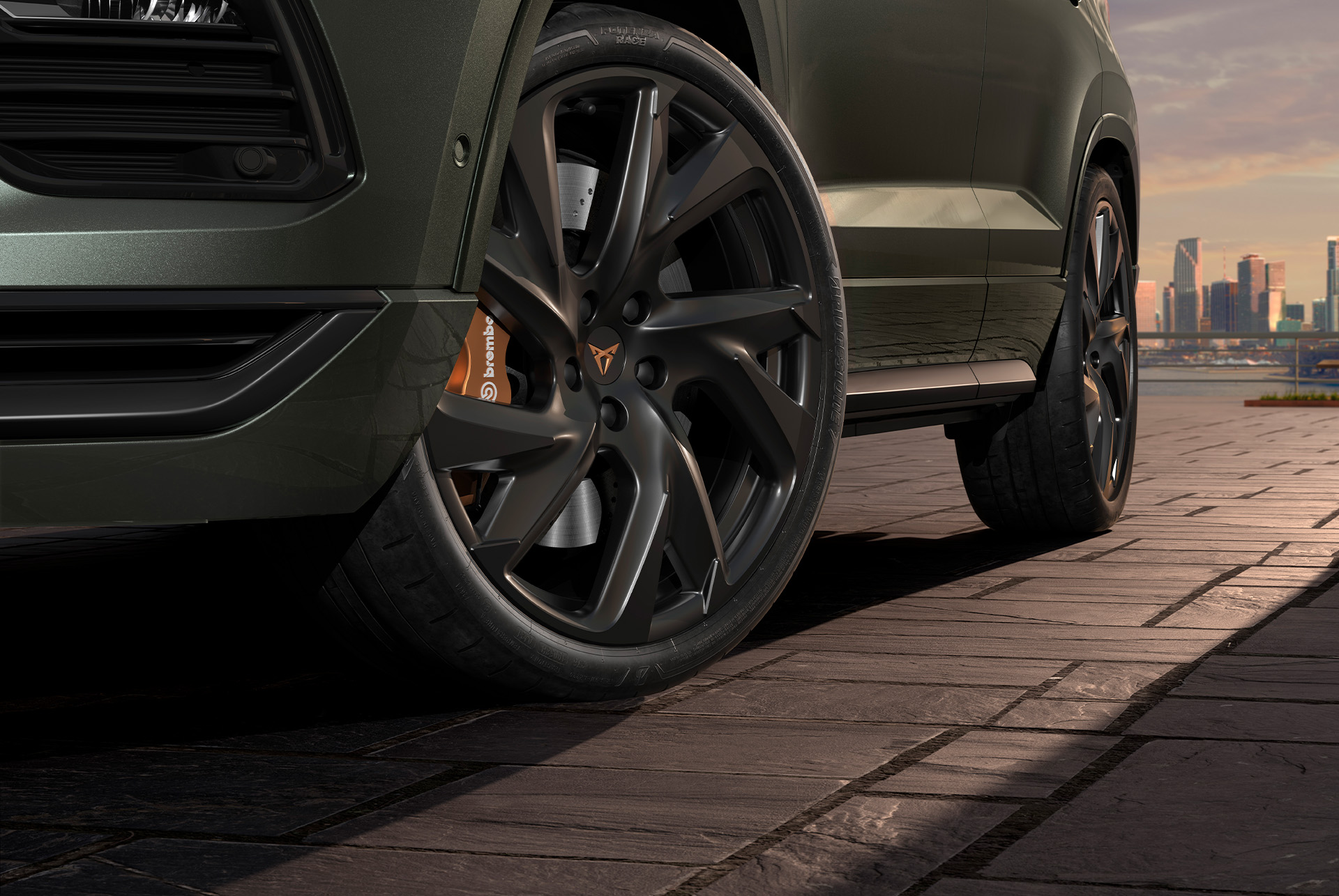 Close-up of the CUPRA Ateca Tribe Edition's 20″ Black Matt wheels with performance brakes and Brembo calipers in the front. 