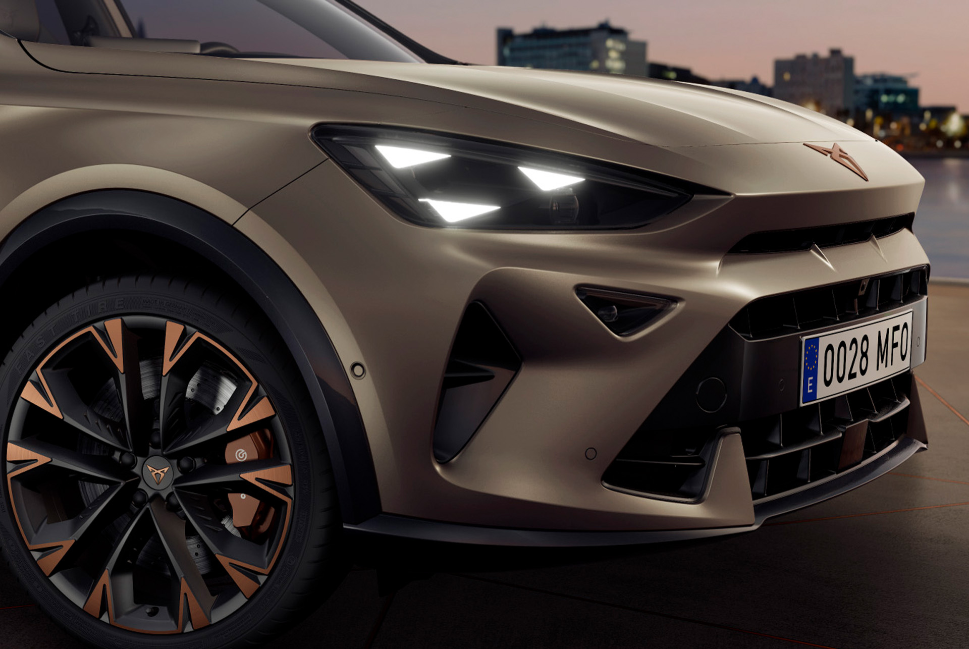 New CUPRA Formentor 2025 in century bronze matt, copper accent wheels, pure performance CUPRA Matrix led lights, headlights with the distinctive triangle eye CUPRA signature.