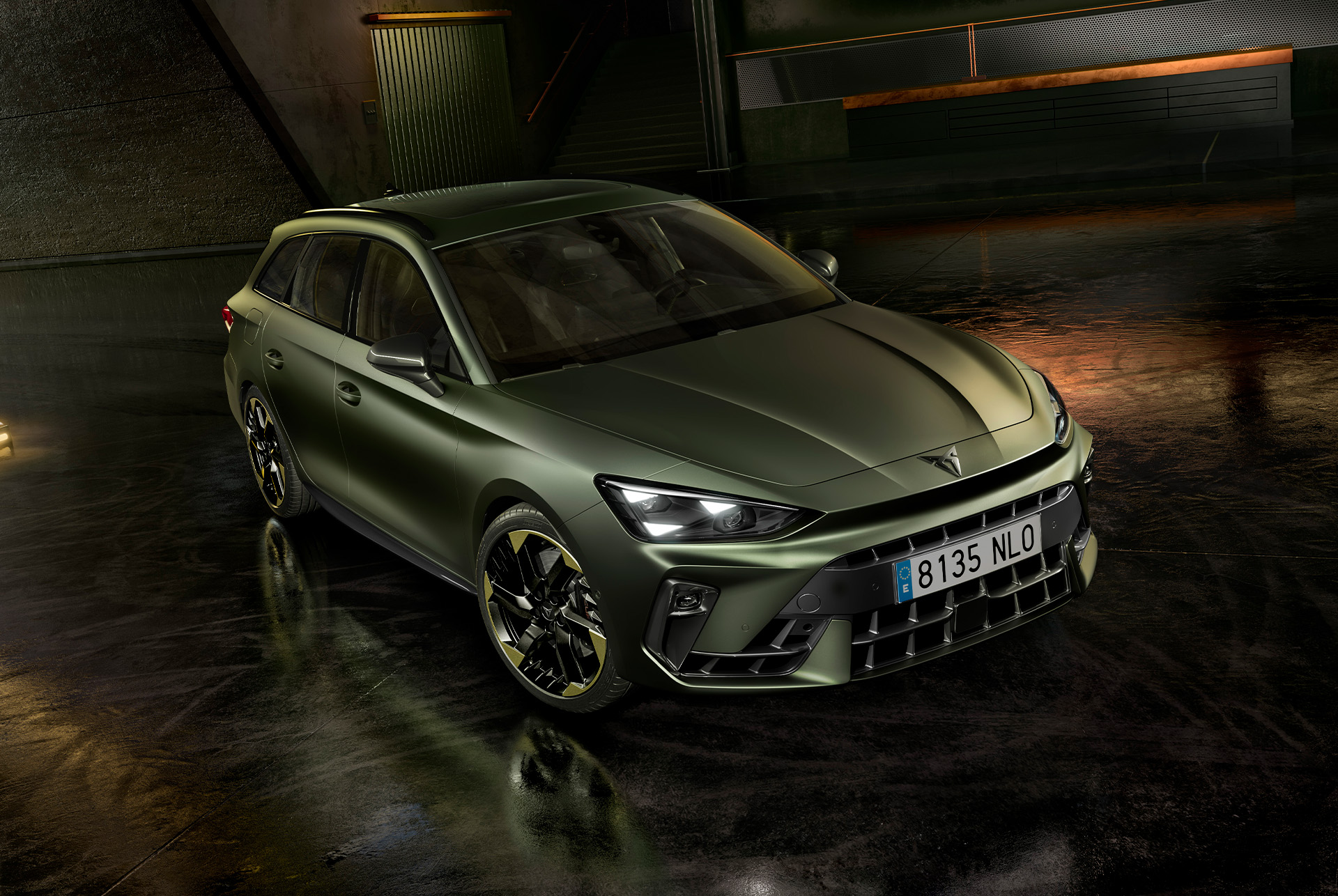 Exterior design of cupra leon sportstourer tribe edition in manganese matt and 19-inch alloy wheels in sulphur, parked in a parking garage.
