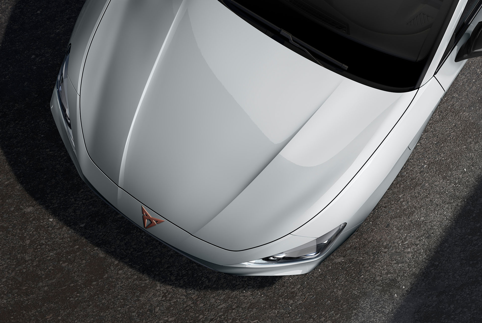 bird’s eye view of a glacial white new cupra leon sportstourer 2025 car hood