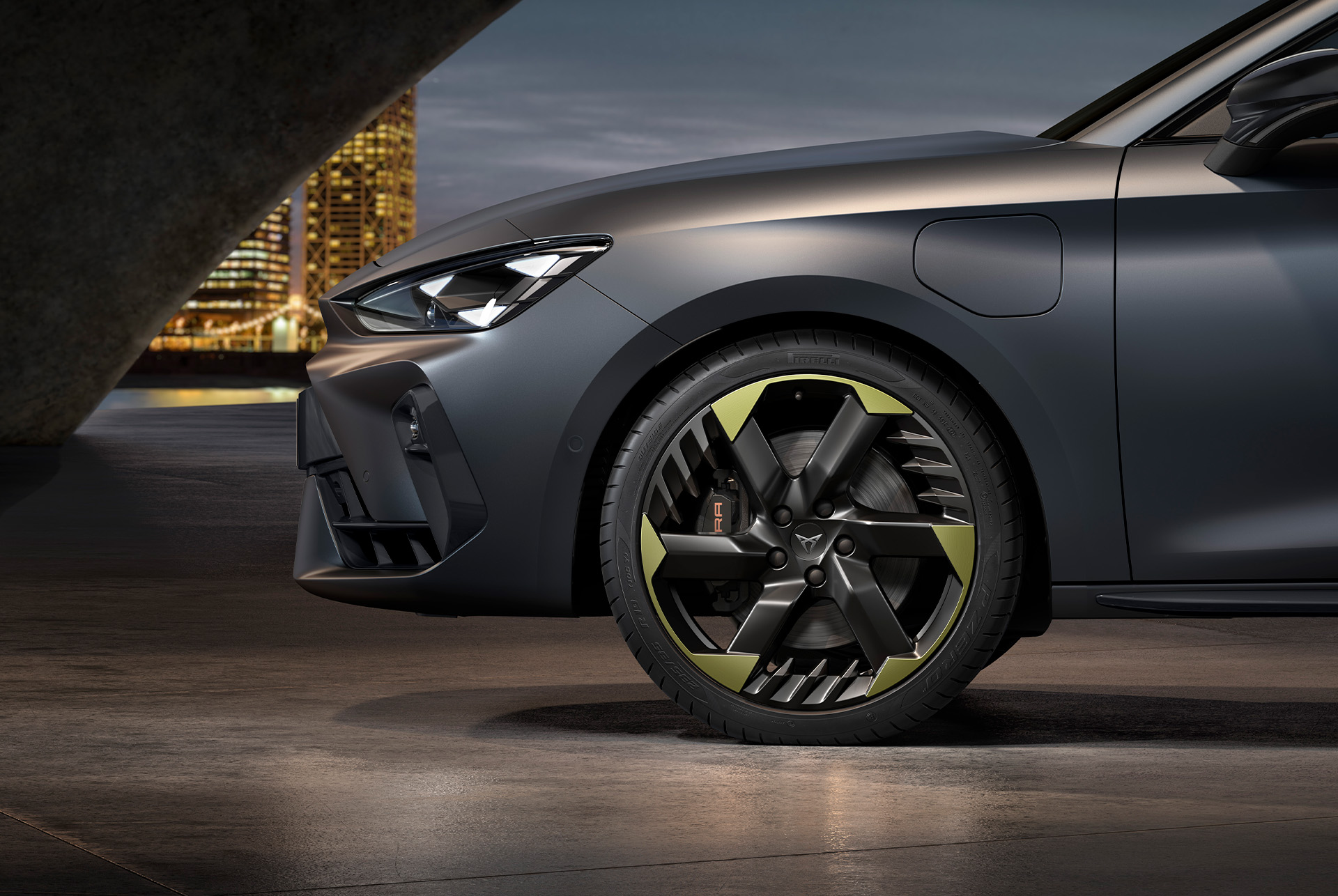 Side view of left 19-inch alloy wheel in sulphur for the new tribe edition, with signature headlights and matt grey body.