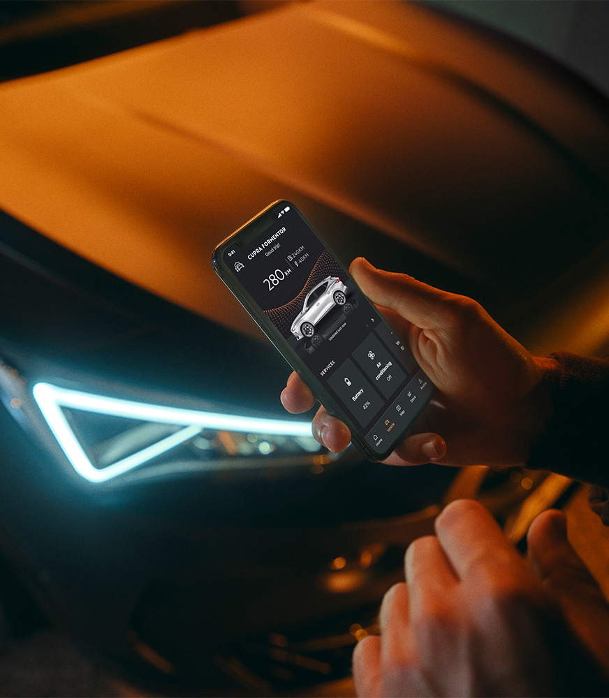 man%20connected%20to%20My%20CUPRA%20app%20with%20his%20smartphone